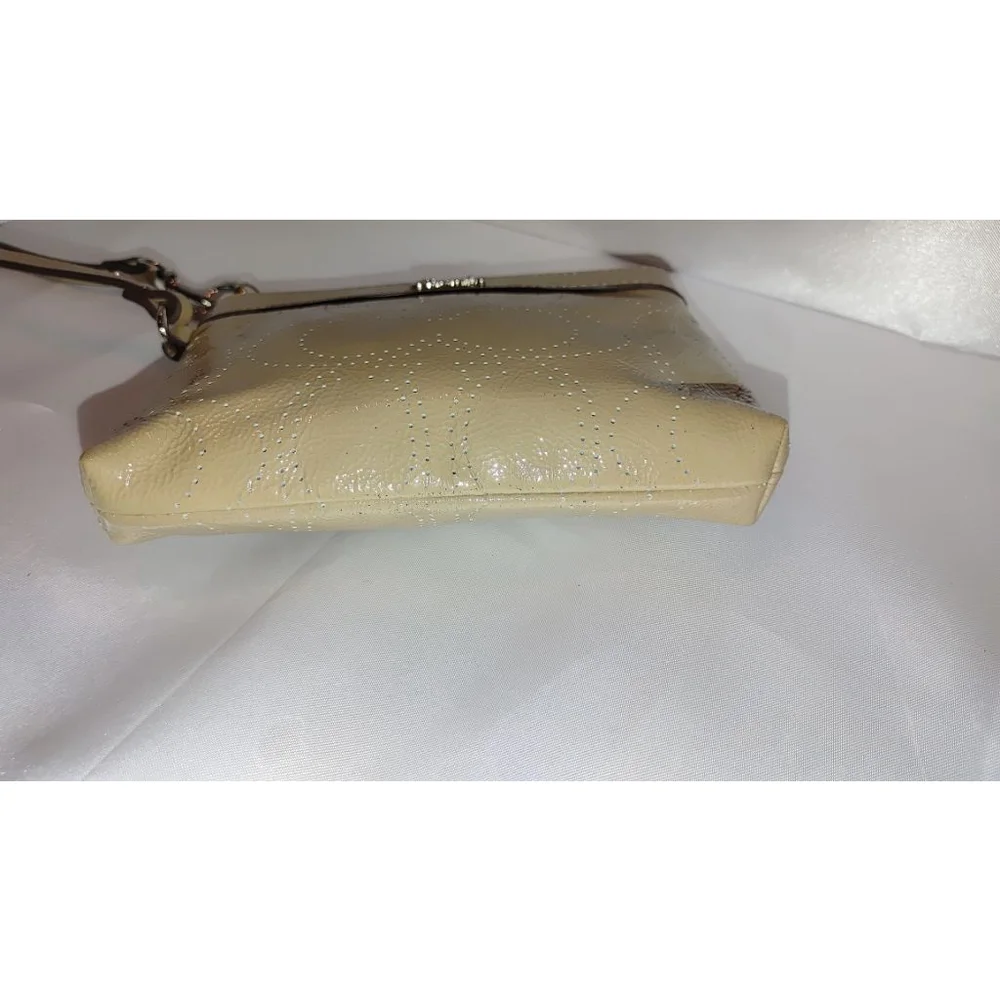 Coach Perforated Signature C Patent Leather Sand Colored Wristlet